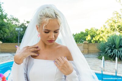 Sensual Bride By The Pool In White Lingerie And Sheer Dress - photo 01