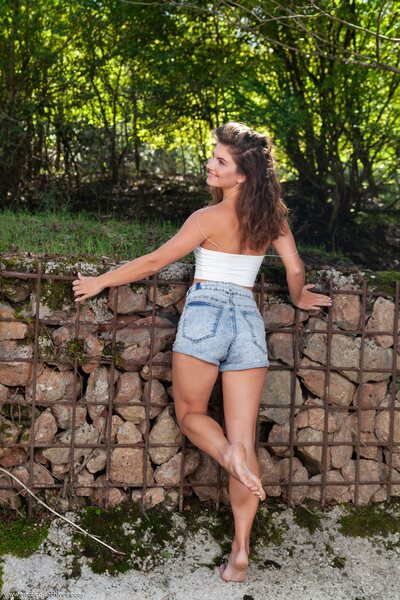 Kassie Posing Outdoors In Denim Shorts With Soft Natural Sunlight - photo 02