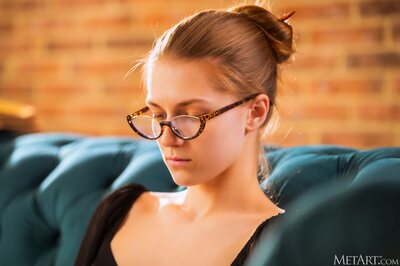 Cozy Indoor Reading Scene With Ozzy In Glasses And Soft Light - photo 00