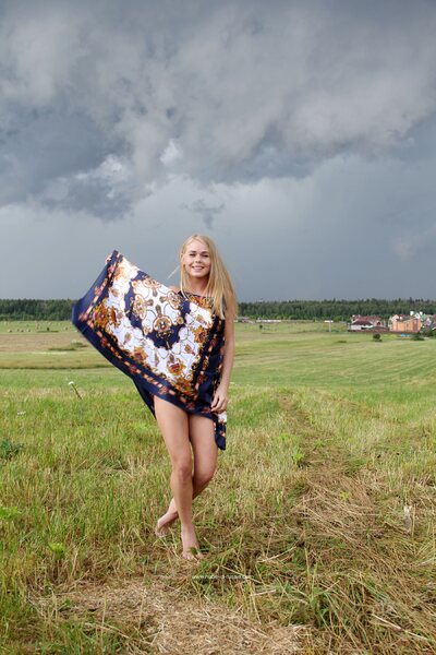 Natural Meadow Portrait With Darina Beneath Stormy Summer Skies - photo 01