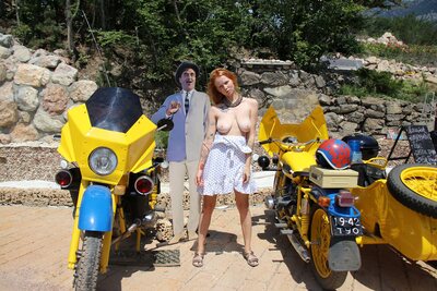 Xenia Poses Nude Beside A Bright Yellow Sidecar Outdoors  - photo 01