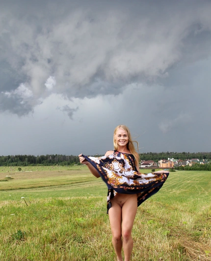 Natural Meadow Portrait With Darina Beneath Stormy Summer Skies