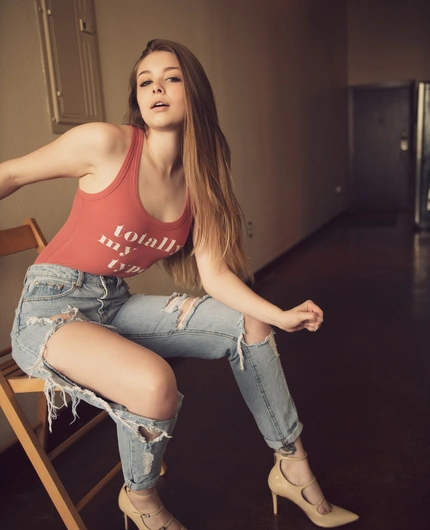 Casual Red Top And Ripped Denim Portraits With Lana Lea
