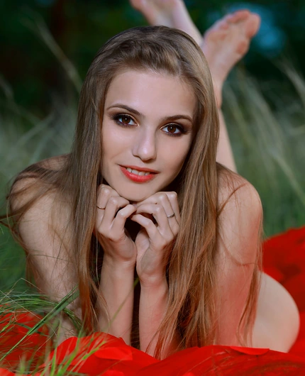 Red Dress Portraits Of Elle Tan In A Peaceful Green Meadow