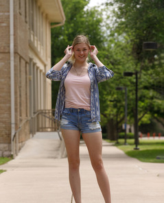 Amber Moore Undresses In Pink Top And Denim Shorts Outdoors