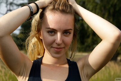 Blonde Beauty Outdoors In Red Shorts Teasing Under Sun - photo 03
